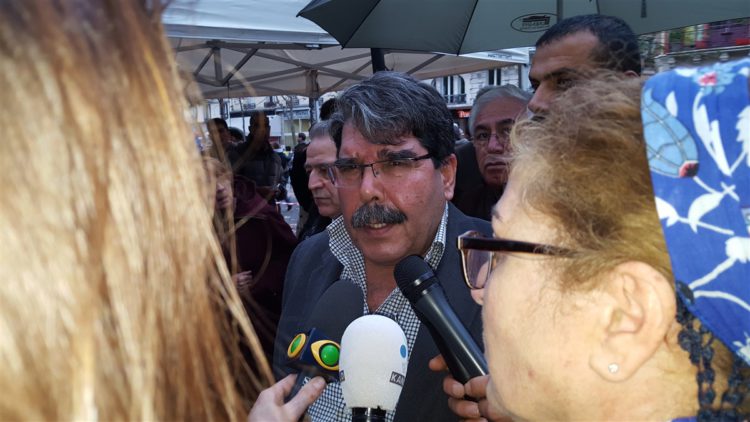 Saleh Moslem visits a scene of Paris attacks